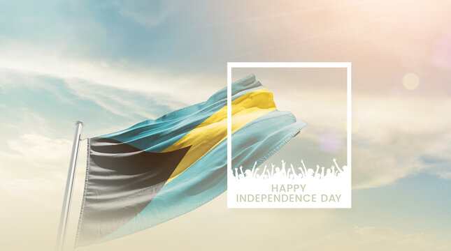 The Bahamas flag waving proudly under a bright sky with text happy independence day. The Bahamas national flag for independence day. - Powered by Adobe