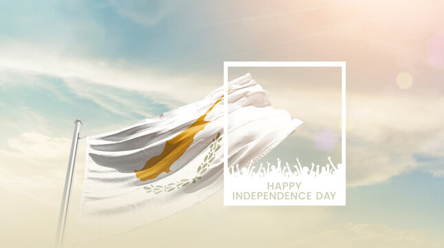 Cyprus flag waving proudly under a bright sky with text happy independence day. Cyprus national flag for independence day.