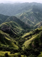 Naklejka premium Lush mountain range, valleys, and peaks