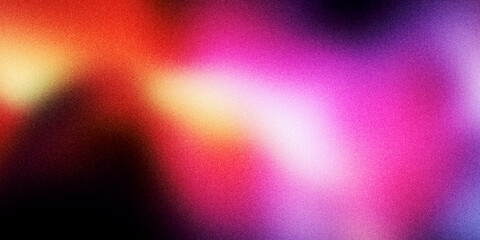 Vivid abstract background with bright pink purple and red tones blended together with soft blur and grainy noise texture