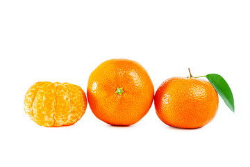 Juicy shiny whole and peeled tangerines with  leaf isolated on white.