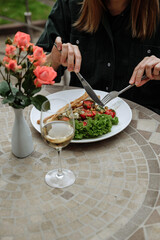 Woman enjoying a healthy meal outdoors