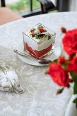 Elegant dessert served on a table with floral details