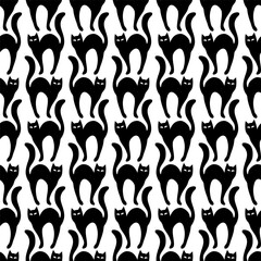 Black cats silhouettes. Seamless flat pattern on transparent background, vector illustration.