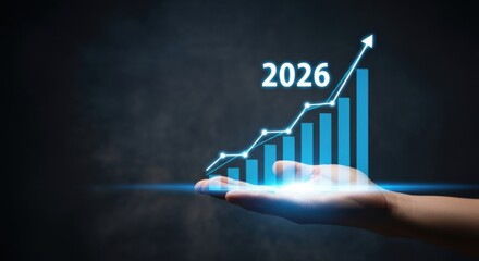 Hand Holding Digital Business Graph Showing Growth in 2026