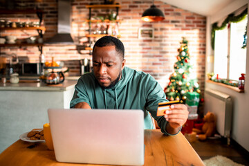 Man shopping online during holidays