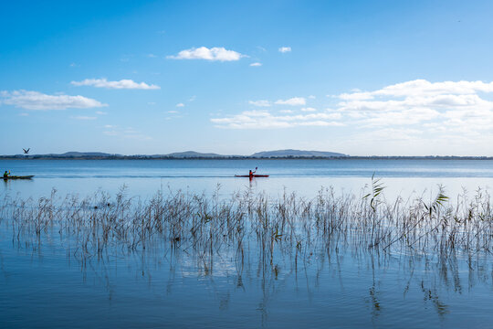 Kayaker paddling on Lake Colac, Victoria, Australia