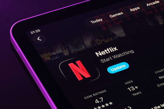 Netflix app on iPad, Apple Liquid Glass updated App Store listing closeup. Stafford, United Kingdom, September 18, 2025.