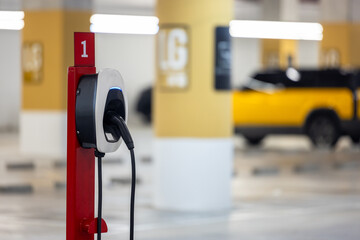 EV charging and electric car, Electric car charging station for charge EV battery, Plug for vehicle...