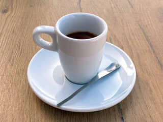 Morning Espresso on Wooden Table
