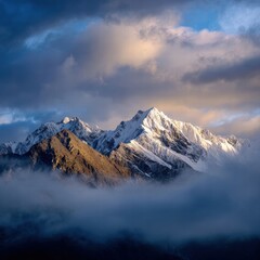 Majestic Snow-Capped Mountain Range with Dramatic Sky