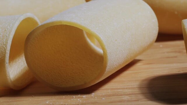 Italian pasta Paccheri, Cannelloni type of pasta in the shape of a very large tube, originating from Campania