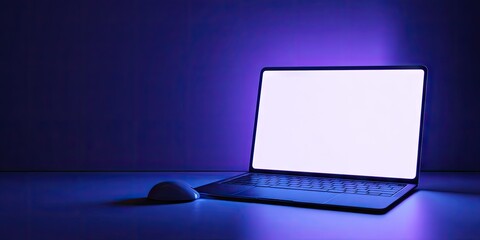 Laptop with blank screen and mouse on a purple surface.