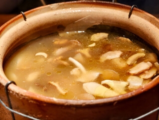 Chinese Yunnan mushroom soup close up