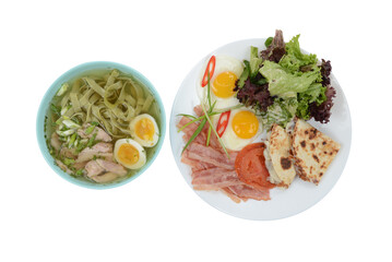 set soup with noodles and bacon with egg and salad