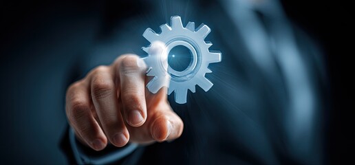 Hand touching gear, business technology concept, innovation.