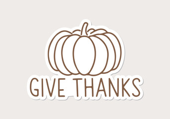 Minimalist holiday art with harvest pumpkin and an inscription Give Thanks.