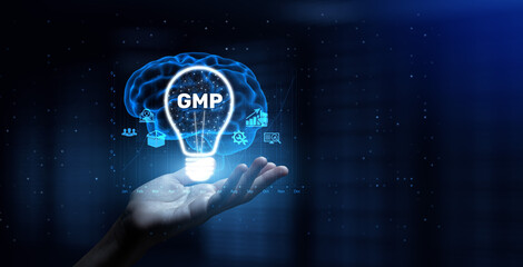 GMP Good Manufacturing Practice Ensuring Quality and Compliance in Production with Human Hand Holding Lamp Hologram.