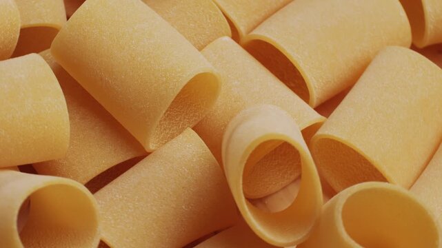 Italian pasta Paccheri, Cannelloni type of pasta in the shape of a very large tube, originating from Campania