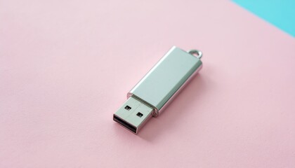 Fototapeta premium Isolated silver USB flash drive on a minimalist background, perfect for digital storage and data transfer solutions, transparent background