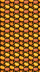 Pumpkins and autumn leaves pattern on black background