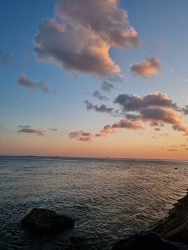 the sunset with beautiful clouds over the sky at the seaside in Istanbul