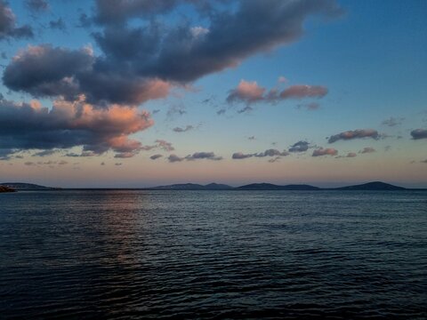 the sunset with beautiful clouds over the sky at the seaside in Istanbul