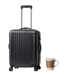 Black suitcase, traveling mood, next to a coffee cup, minimalistic style, copy space