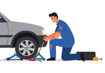 Mechanic working on a car with a jack and spare tire