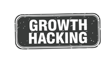 A black and white sign with rounded corners displays the words 