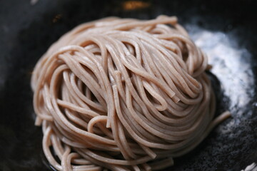 Close up a Soba noodles in a bowl