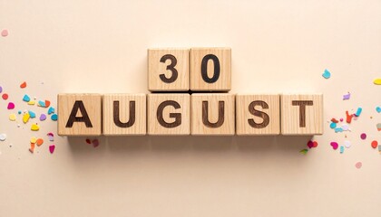 Wooden Blocks with Date 30 August. Calendar for birthday or anniversary on solid colored background with confetti