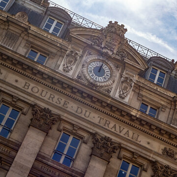 PARIS, FRANCE - AUGUST 04, 2018: Bourse du Travail (Labour Exchange) in Rue du Chateau-d'Eau with its Classical Renaissance style clock