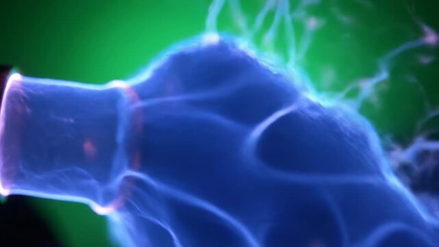 Extremely slow motion view of a fragile glass sculpture crumbling into dust and small pieces, isolated on green screen fragile glass sculpture, breaking apart, realistic