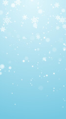 blue christmas background with snowflakes and snow fall , christmas and new year winter holiday vertical social media background