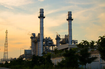 Obraz premium Natural Gas Combined Cycle Power Plant ,Gas turbine electrical power plant with in Twilight power for factory energy concept.