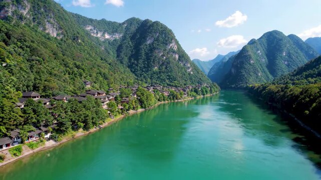 Village scenery between mountains and rivers Village scenery where mountains and rivers depend