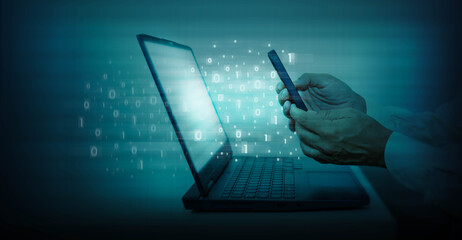 Man using mobile phone and laptop computer with binary code on blue background. Concept of digital data transmission between devices.