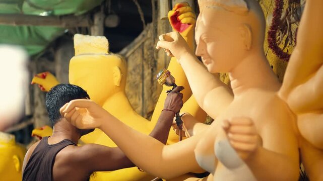 Maa durga Painting, Making of goddess Durga Idol. These idols are made for Durga Puja at Kumartuli, the biggest festival of Kolkata, West Bengal