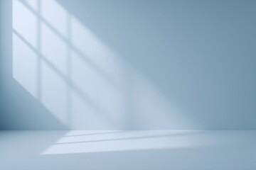 Airy blue studio basks under diffused light, ideal for showcasing product presentation or providing a serene backdrop for creative composition
