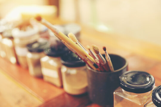 Painting Brushes and Natural Pigments. Creative Hobby and Art Materials.