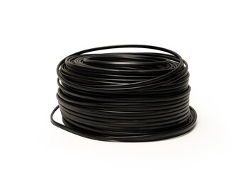 Roll of black VVG electrical installation cable isolated on white background.