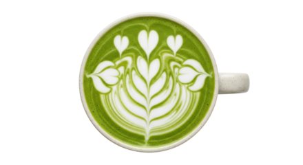 Isolated matcha latte art in a mug with green creamy foam design, top view close-up