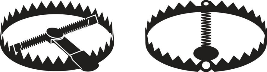 Two open animal traps with sharp teeth isolated on white background