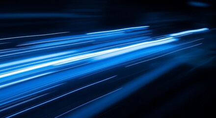 Fast Moving Blue Light Trails on Dark Background.