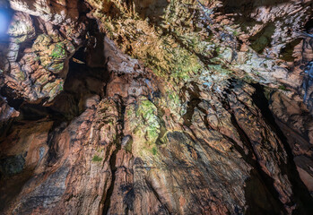 Cave ceiling with stalactites and growth