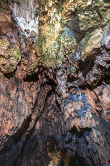 Cave ceiling with stalactites and growth