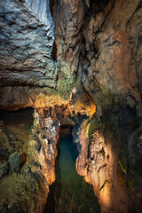 Underground river inside limestone cave