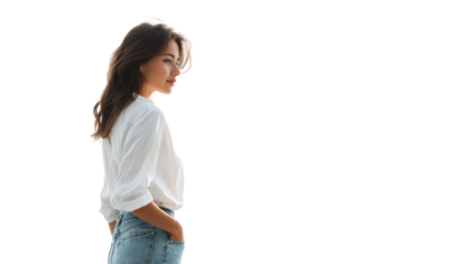 A thoughtful young woman in casual attire, with soft natural light, standing in profile against a white background.