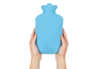 Isolated hot water bottle held by hands, covered with blue knitted woollen fabric cover